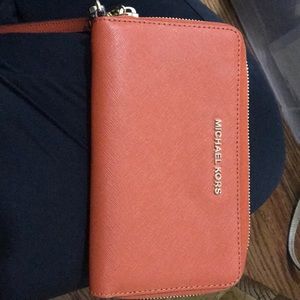 Orange Michael Kors large wallet